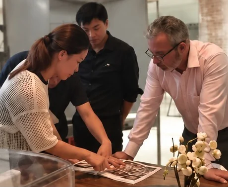 Team reviewing samples and designs for a new product